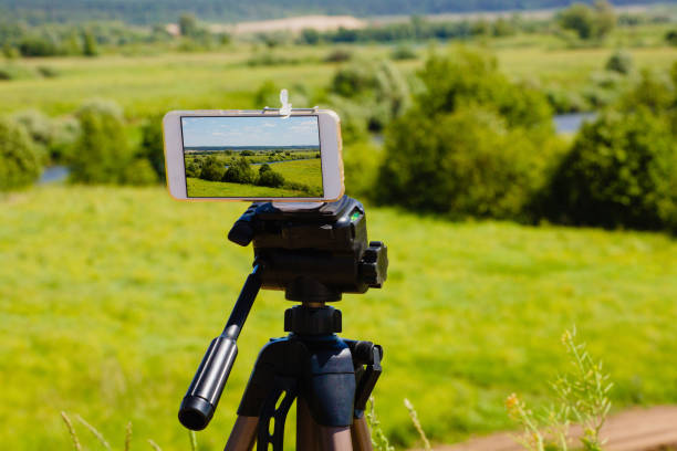 istock Smartphone on tripod capturing summer landscape 1024928988