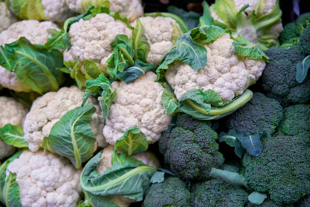 istock broccoli and cauliflower on market store oudoor 1024931902