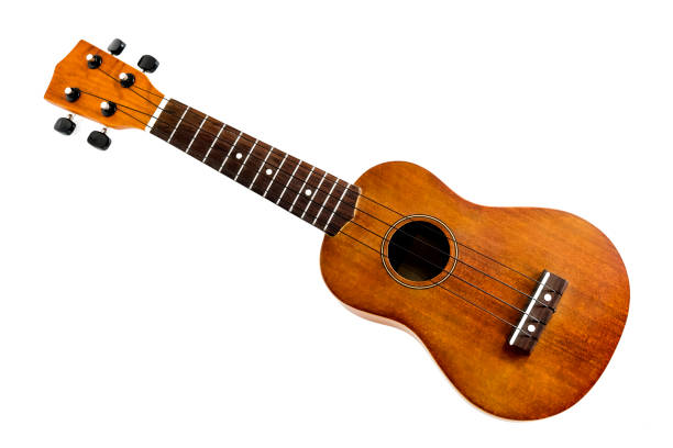 istock The brown ukulele on the white background, with Clipping path 1024940432
