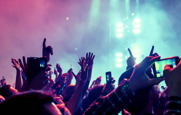 istock People Enjoying At Music Concert 1024947012