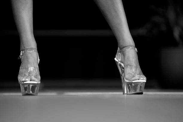 istock Low Section Of Woman Wearing High Heels 1024947802