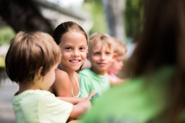 istock Children playing with colored dough at vacation 1024947974