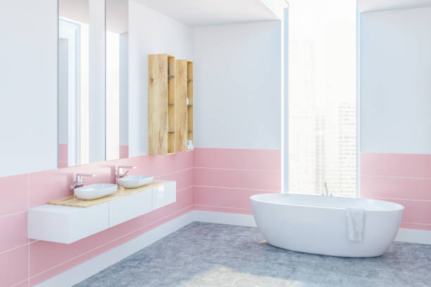 istock White and pink bathroom, bathtub and sink 1024984752