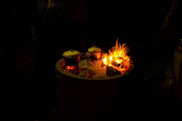 istock Outdoor Cooking in Cooking Pans in Fire Pit 1024996334
