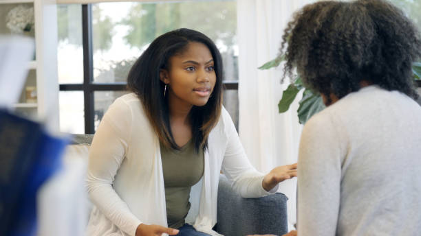 istock Upset teenager talks with her mom 1025006112