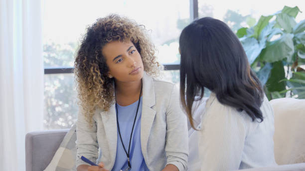 istock Attentive therapist listens to client 1025006368