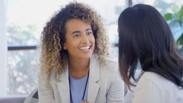 istock Encouraging therapist talking with patient 1025006370