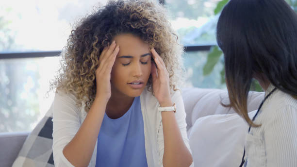 istock Upset woman talking about problems with therapist 1025006374