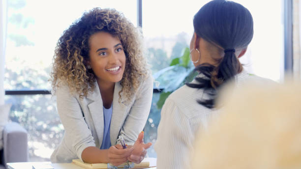 istock Confident therapist helps woman with her issues 1025006394