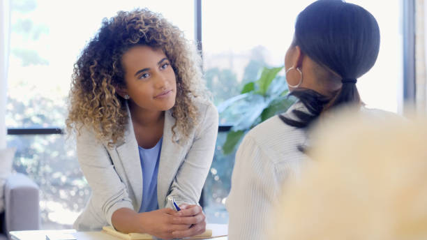 istock Understanding therapist listens to patient 1025006404