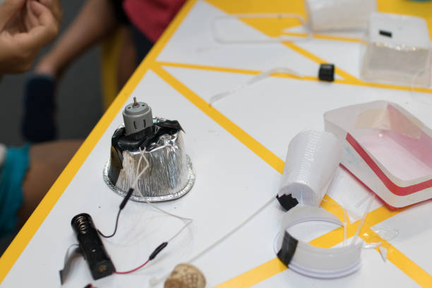 istock construction of a robot from waste materials. STEM activities for children on technology, electronics, robotics and circular economy. 1025034916