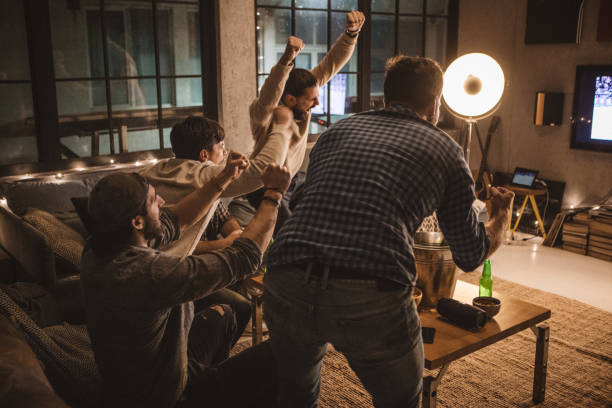 istock Friends spend weekend together watching TV 1025036646