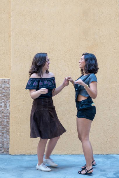 istock Two girls dancing outside 1025047722