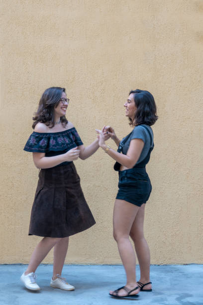 istock Two girls dancing outside 1025047800