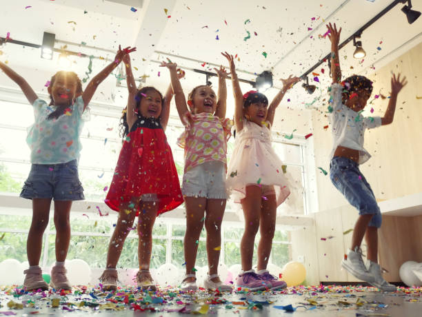istock Children playing and jumping in the summer holiday. 1025047982
