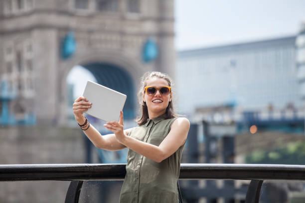istock Tourist enjoying vacations 1025067112