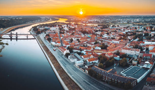 istock High Angle View Of Townscape By River Against Sky During Sunset 1025092072