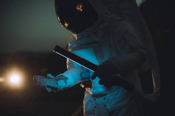 istock Cosmonaut on mission in space 1025119362