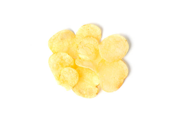 istock Top view of potato chips isolated on white background 1025135216