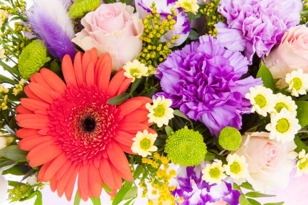istock Bright buketny composition from fresh flowers, the white background 1025140798