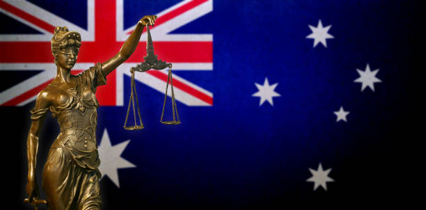 istock Lady Justice before an Australian flag 1025140806