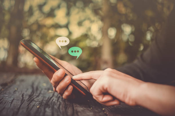 ChatGPT: Enhancing Everyday Life through Convenience and Personalization 2 women hand using smartphone typing chatting conversation in chat box icons pop up social