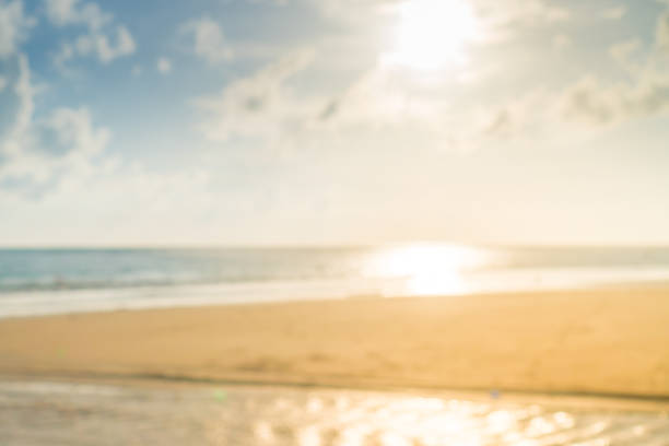 istock Blur beach  relaxation with sun light and blue sky. 1025141966