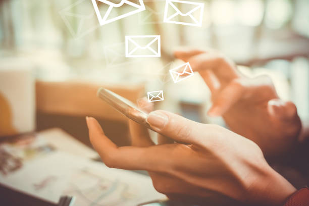 istock Woman hand using smartphone to send and recieve email. 1025153098