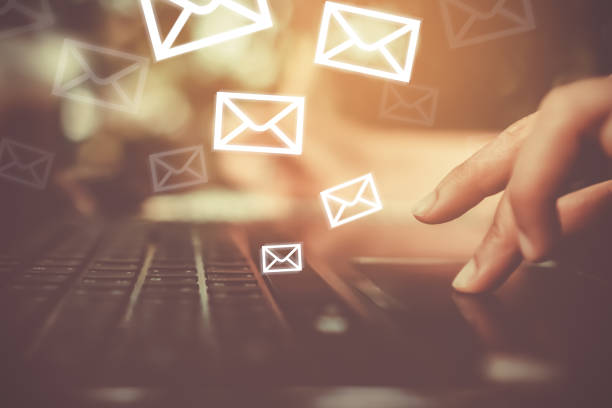 istock Woman hand using smartphone to send and recieve email. 1025157898