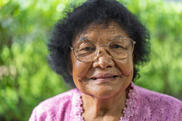 istock senior woman smiling 1025162430
