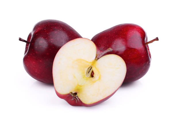 istock whole and half red apple fruit isolated on white background 1025162474