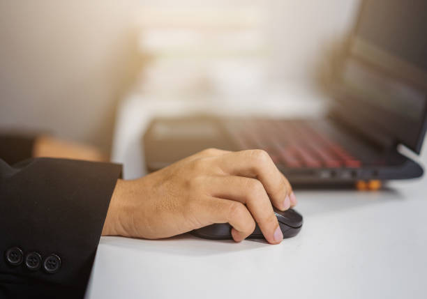 istock hand clicking mouse of laptop 1025170044