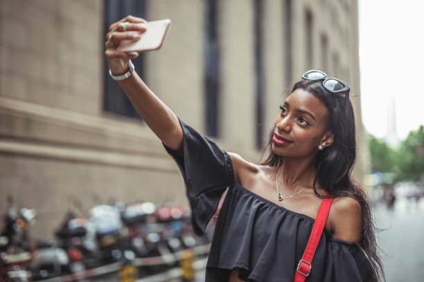 istock Black woman taking a selfie 1025175008