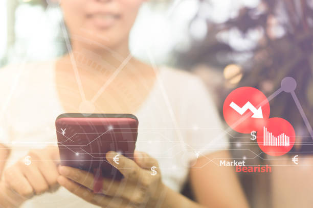 istock Woman hand using smartphone or tablet to do business. 1025192410
