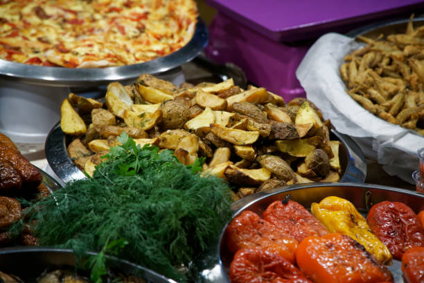 Street food on night outdoor market. Spicy, seafood, veggie, vegetable meal Street food on night outdoor market. Spicy, seafood, veggie, vegetable hot meal elefant stock pictures, royalty-free photos & images