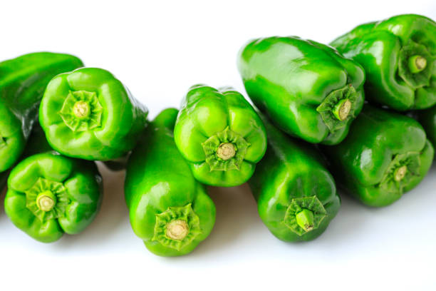 istock Green pepper and white background 1025197502