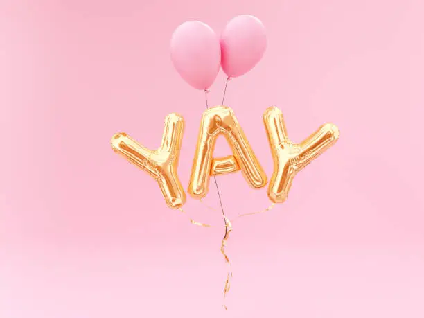 Photo of YAY word, foil balloon letters