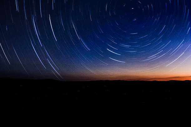 istock night sky trails stars  long exposure thunder 1025207008