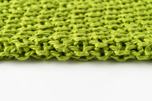 istock Close-up of knitted wool blanket on white background. 1025226666