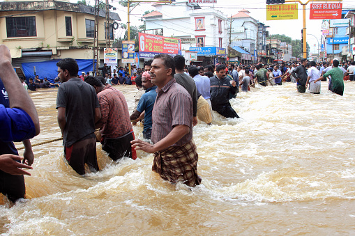 Pathanamthitta, India - August 17, 2018:People watch the rescue operations in the flooded area in Pathanamthitta,Kerala, India. Kerala was badly affected by the floods during the monsoon season