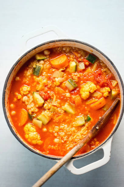 istock One pot vegetable - cauliflower, courgette, tomatoes, carrots, fennel soup 1025238160