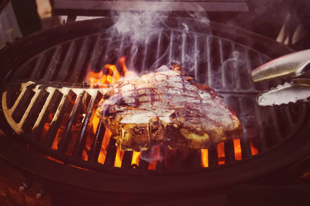 istock Barbecue chicken cooking on an outdoor grill 1025240772
