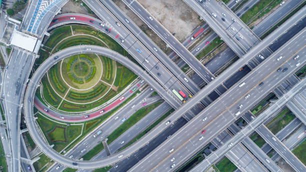 istock Aerial view highway road network connection or intersection for import export or transportation concept. 1025241414