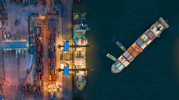 istock Aerial view container ship from sea port working for delivery containers shipment. Suitable use for transport or import export to global logistics concept. 1025244058