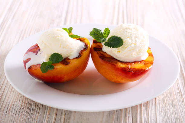 istock Grilled peaches with ice cream 1025271738