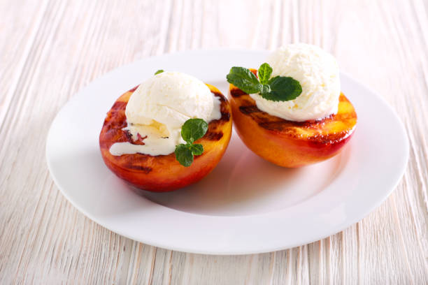 istock Grilled peaches with ice cream 1025271746