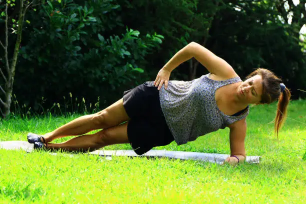 Yoga instructor shows some posture.