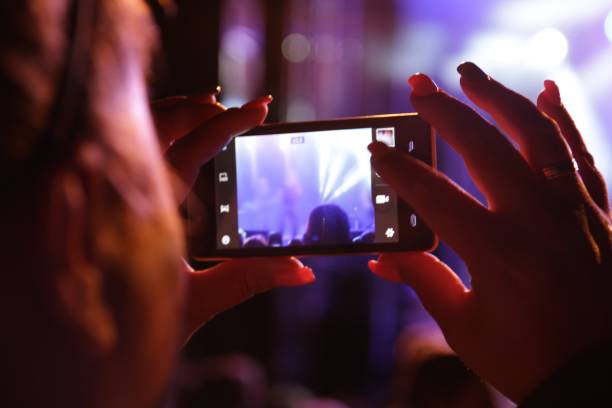 istock woman doing a concert picture 1025294664