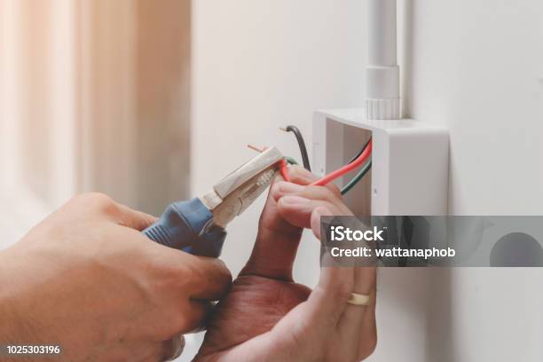 Technology In Home Stock Photo - Download Image Now - Electricity, Electrician, Repairing