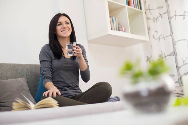 istock Woman drinking water 1025313144